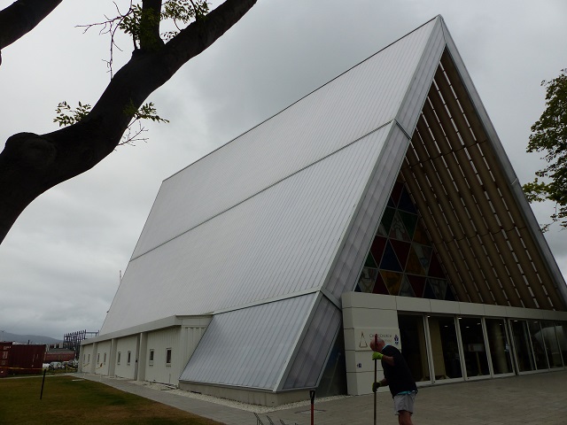 Outside the cardboard cathedral in Christchurch with container rooms to left, Dec 2015